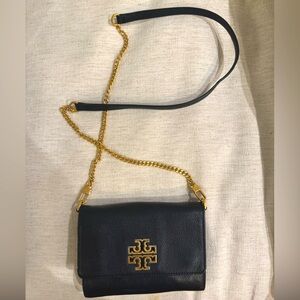 Tory Burch black leather cross body comes with dust bag as well